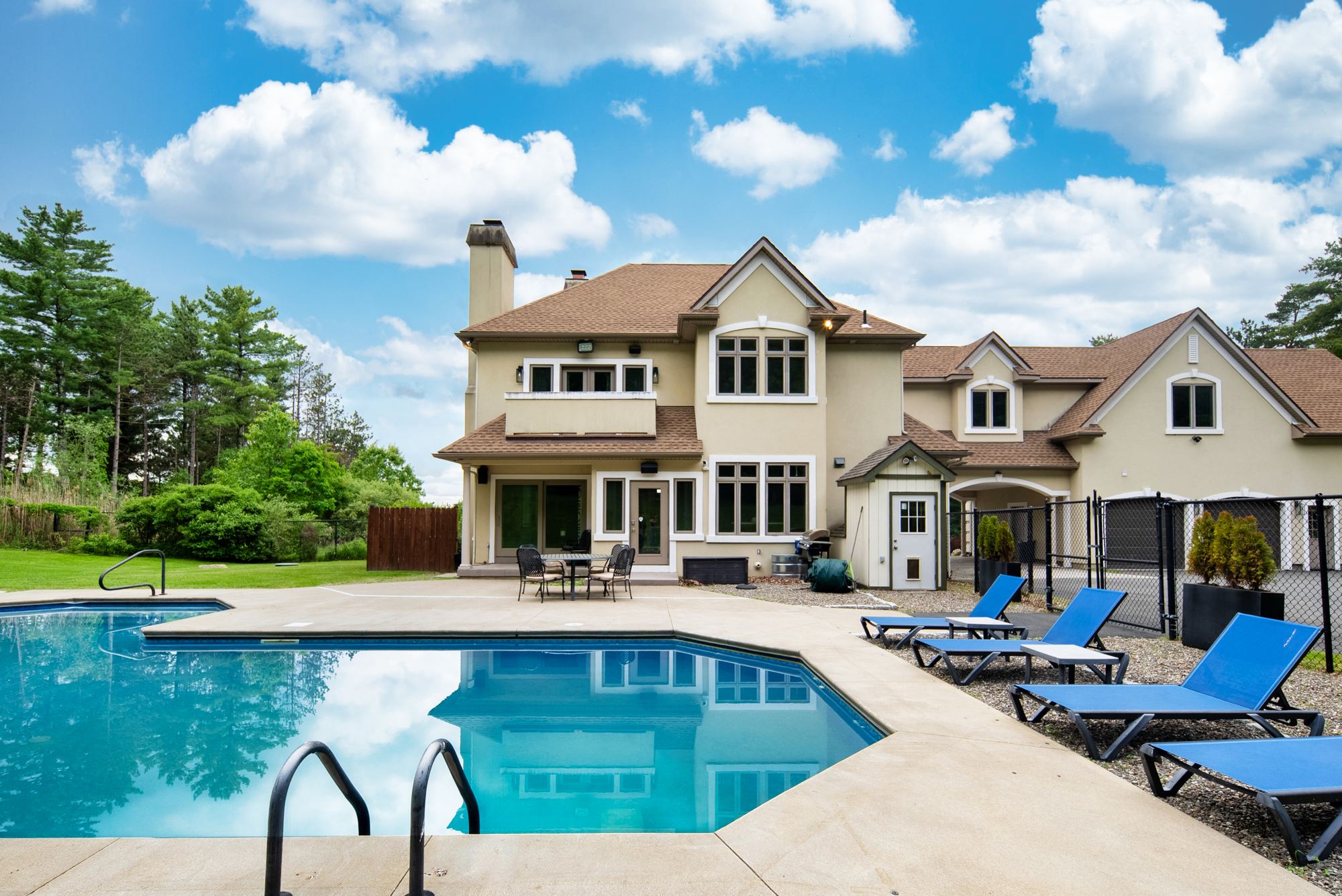 Resort-style pool with the Main House behind
